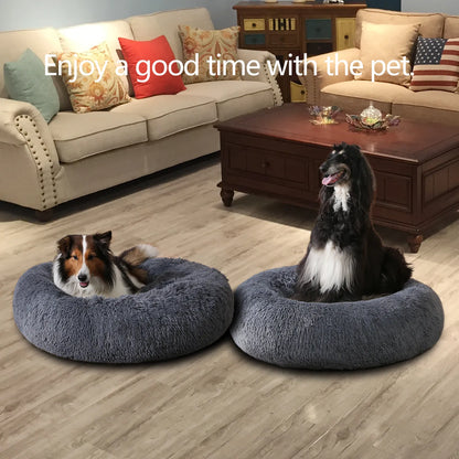 Plush calming donut dog bed, dog resting inside